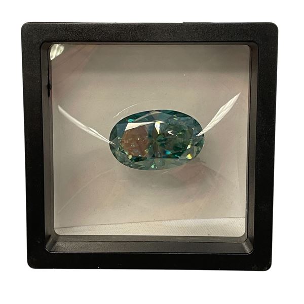 68.90 Carat Bluish Green Moissanite That Is Oval Cut Ready To Set Into Pendant Or Brooch. Replacemen