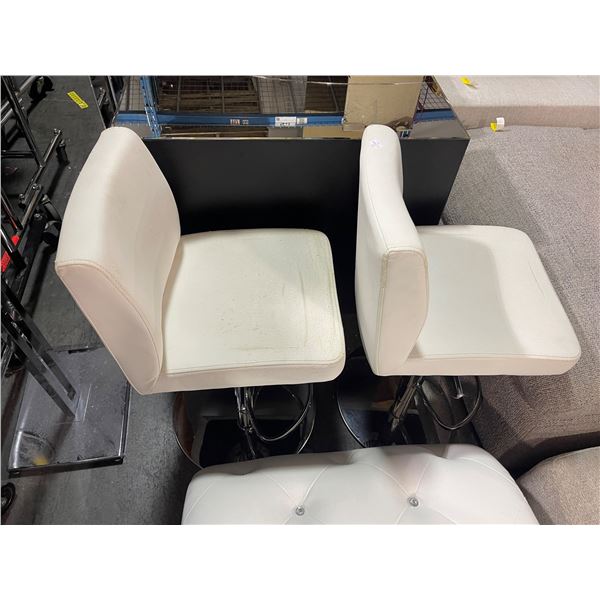 Pair of White Faux Leather Swivel Bar Stools