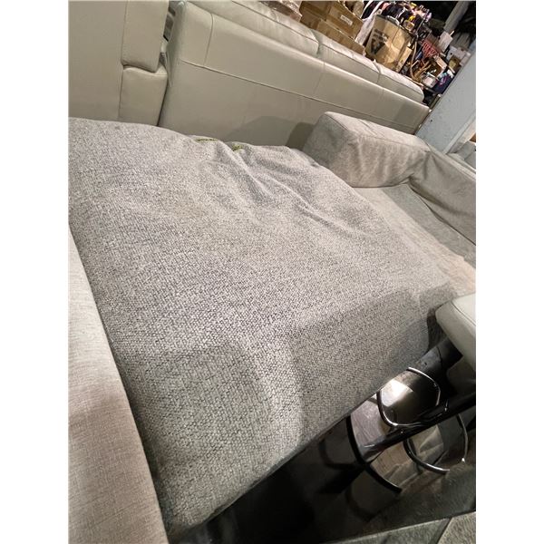 Gray Textured Upholstered Ottoman