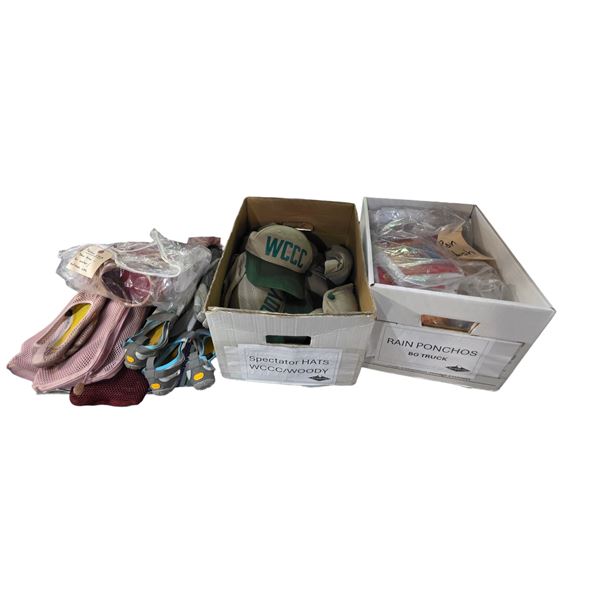 Shelf of Assorted Accessories and Footwear Includes WCCC Hats, Rain Ponchos, and Outdoor Shoes