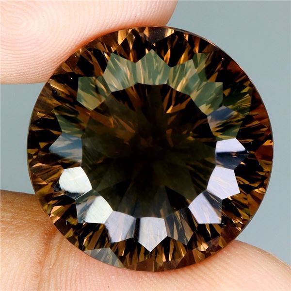 ROUND CONCAVE CUT NATURAL CLEAN SMOKY QUARTZ 30.84 CT. ESTIMATED VALUE 2,200