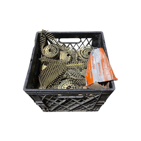 Crate full of Industrial Coils of Collated Framing Nails