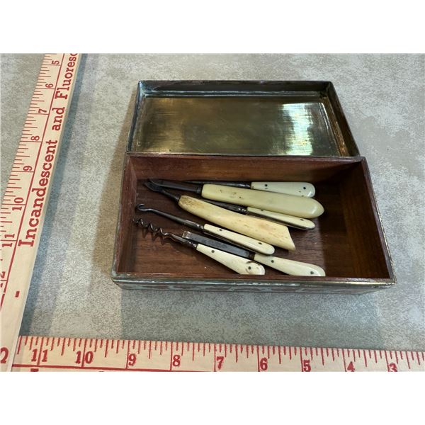 Assortment of Antique Ivory Handled tools in decorative brass box