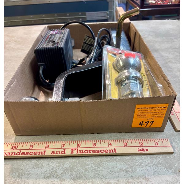 Box of Automotive Items: Trailer Hitch, Hitch Ball (New), Battery Charger
