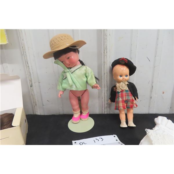 Two Vintage Dolls: Asian-Style Doll with Hat and Scottish Doll in Tartan Clothing