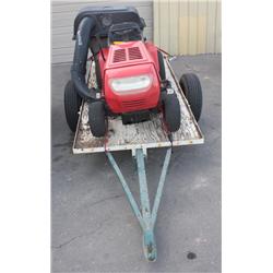Red Yard Machine Riding Mower with Trailer
