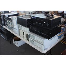 Table lot of computers and electronics