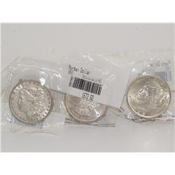 Three Sealed and Graded Silver Dollars