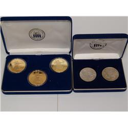 Two Silver and Gold Coin Sets