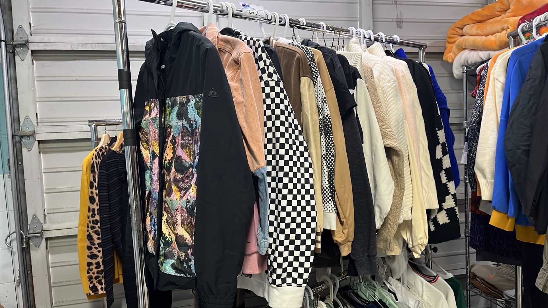 RACK OF ASSORTED CLOTHING: JACKETS & SWEATERS *RACK NOT INCLUDED ...