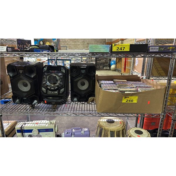SAMSUNG STEREO WITH SPEAKERS & BOX OF ASSORTED CD'S