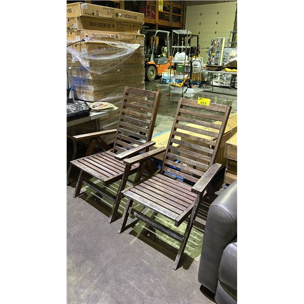 TWO WOODEN FOLDING PATIO CHAIRS