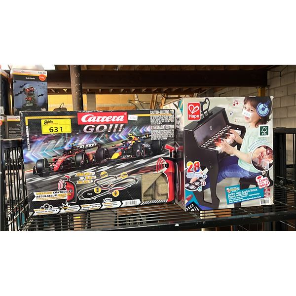1:43 SLOT RACING SYSTEM & A CHILDRENS LEARNING PIANO *WORKING CONDITION UNKNOWN*