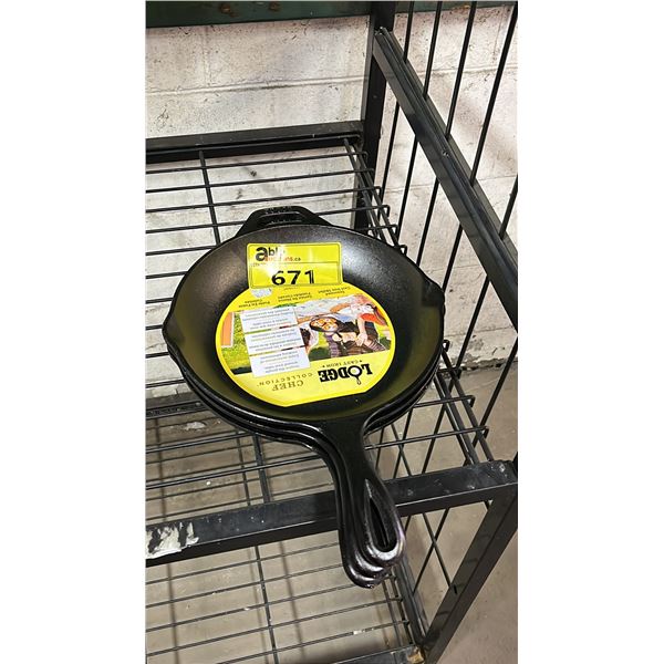 THREE CAST IRON PANS