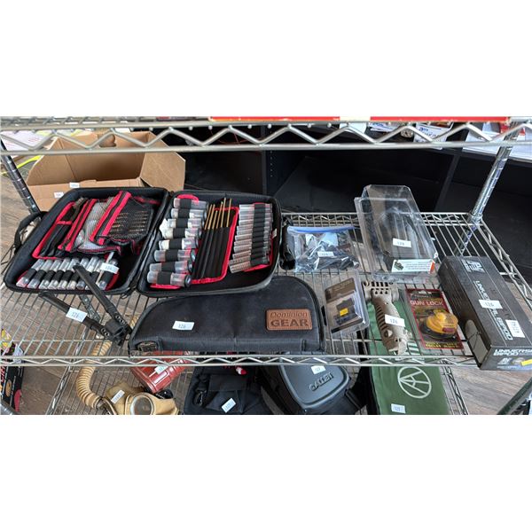 SHELF OF ASSORTED SPORT SHOOTING EQUIPMENT INCLUDING; TRIGGER LOCK, GUN CLEANING KIT, BIPOD & MORE\