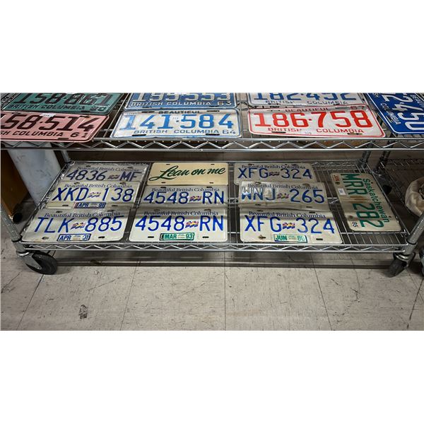 SHELF OF ASSORTED BRITISH COLUMBIA & SASKATCHEWAN LICENSE PLATES