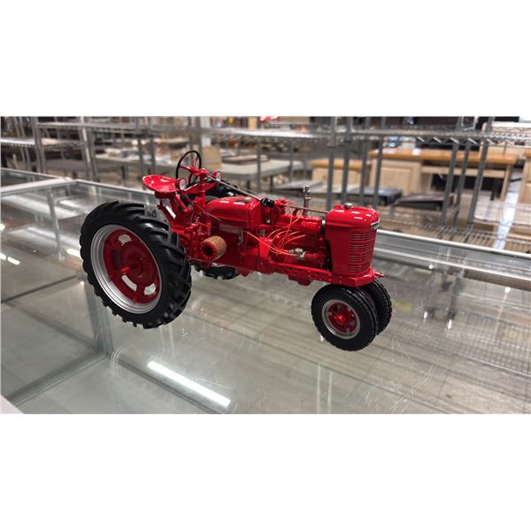 THE FARMALL MODEL H TRACTOR