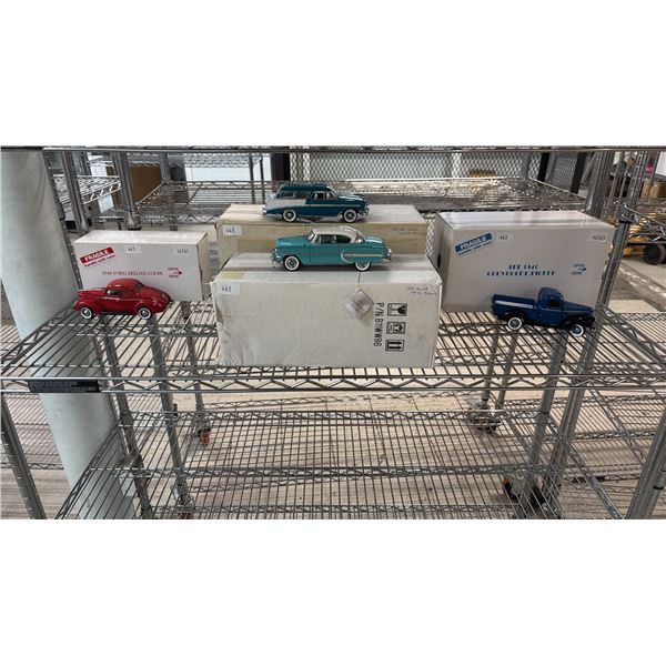 FOUR DIECAST MODEL VEHICLES