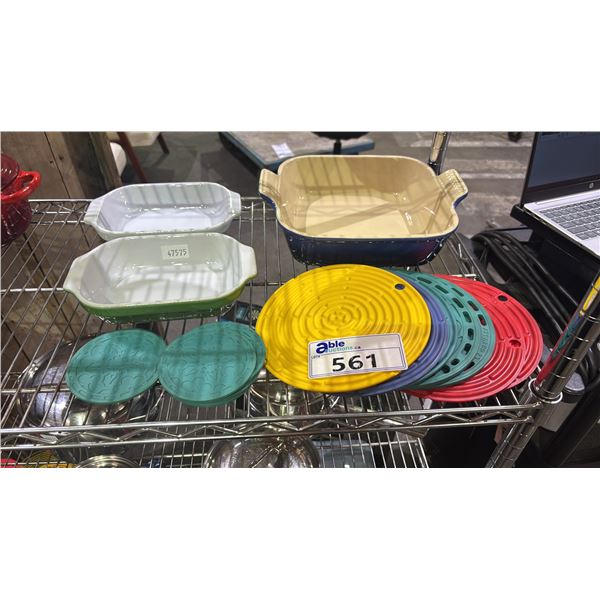 TWO EMILE HENRY CASSEROLE DISHES, LE CREUSET CASSEROLE DISH & LE CREUSET POT HOLDERS