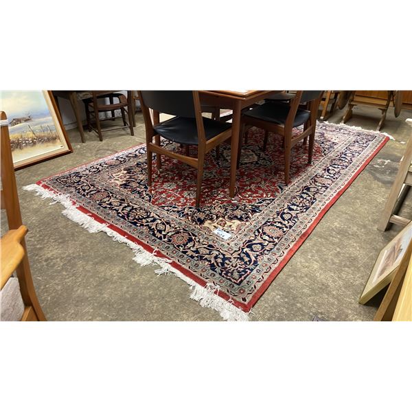 PATTERNED 9' X 6' AREA RUG WITH UNDERLAY *CONTENTS ON RUG NOT INCLUDED*