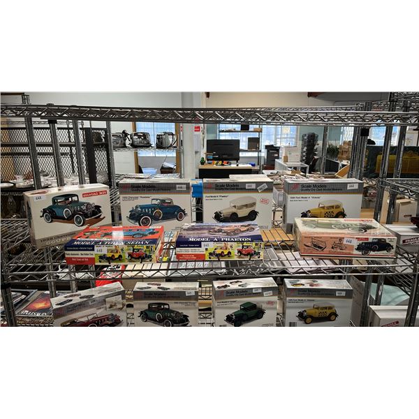 SHELF OF ASSORTED CAR MODEL KITS - 1 IS SEALED