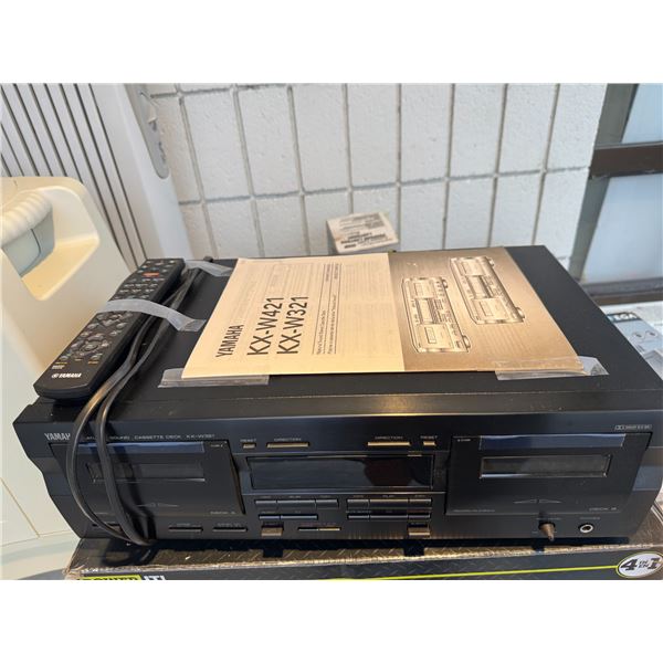 Yamaha asset player with remote and manual
