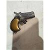 Image 1 : Small cap gun?