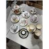 Image 1 : Teapot and tea, cups, and saucers
