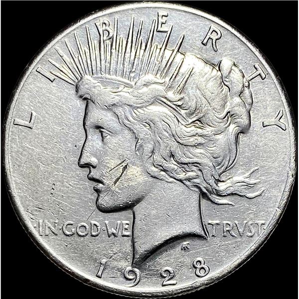 1928 Silver Peace Dollar NEARLY UNCIRCULATED