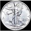 Image 1 : The coin is a 1933 Walking Liberty Half Dollar. CLOSELY UNCIRCULATED