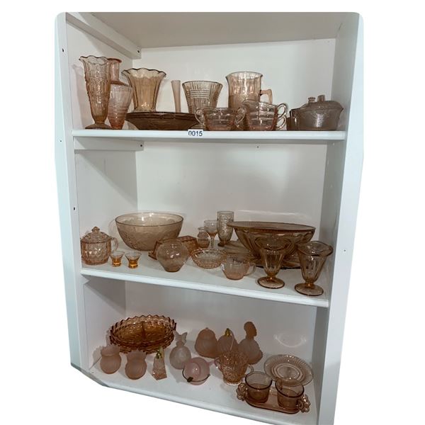 3 shelves full of assorted rose gold glassware