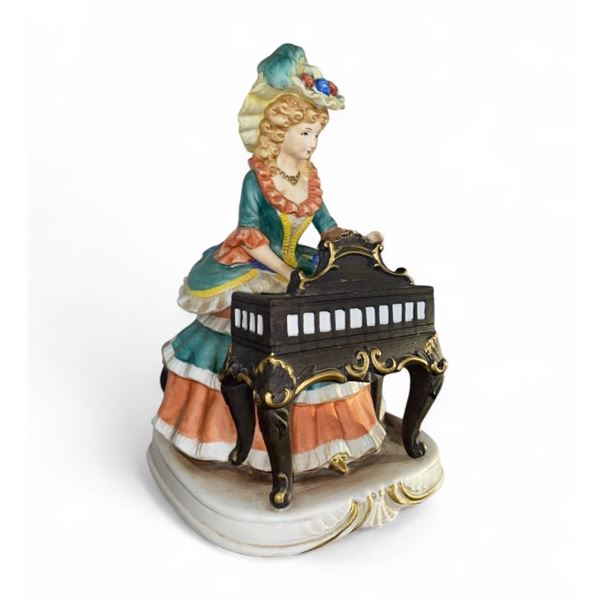Melody in Motion handmade & hand-painted porcelain electric pianist modeled by Seiji Nakene - 10 1/2
