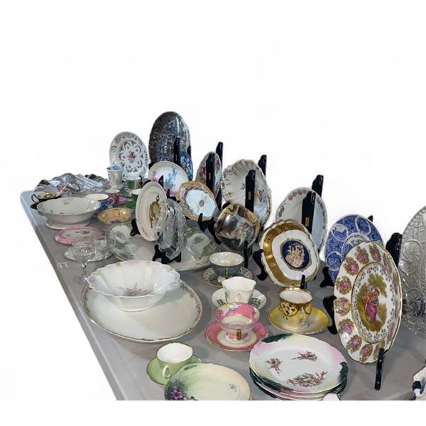 Large group of assorted decorative plates, tea cups, saucers, serving dishes