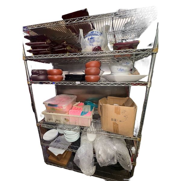 Rack full of assorted restaurant plates, serving bowls, wooden serving trays etc. (rack not included