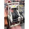 Image 1 : GARDEN HOSE ON MOBILE HOSE REEL