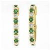 Image 1 : 18K Gold 2.74 ctw Alternating Round Diamond & Emerald Oval Hoop Huggie Earrings