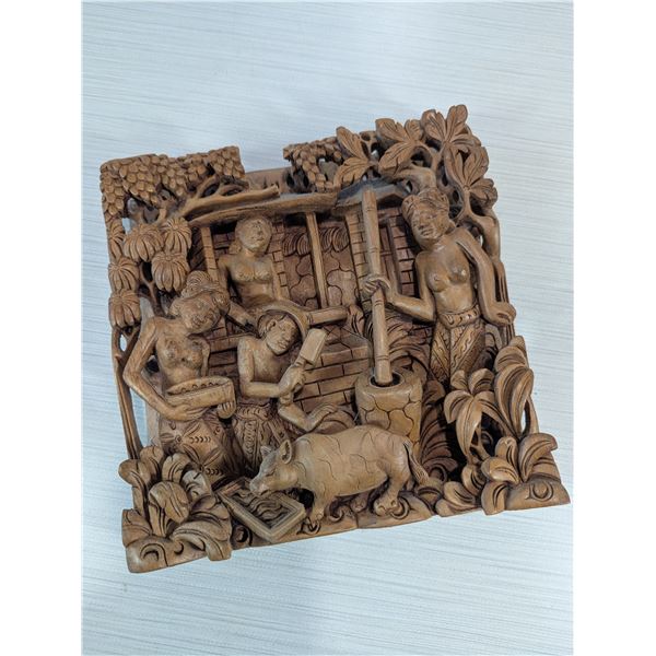 Balinese hand-carved wooden wall panel.