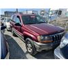 Image 1 : JEEP GRAND CHEROKEE 1999 T-DONATION