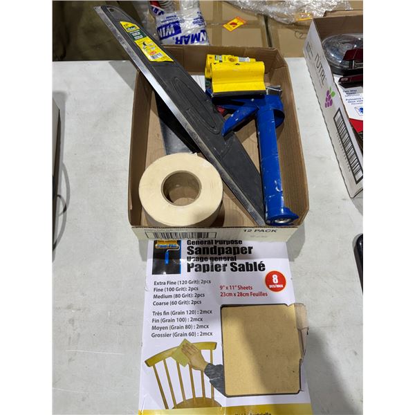Assorted sandpaper and tools