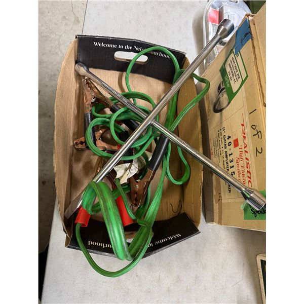 Booster cables, and tire iron