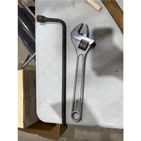 Crescent wrench and tire iron