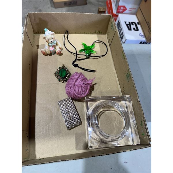 Necklace, bear, and other items