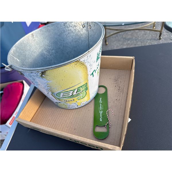Bud lite lime, tin bucket, and bottle opener