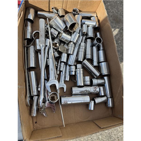 Assorted sockets and wrenches