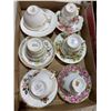 Image 1 : Assorted tea, cups, and saucers