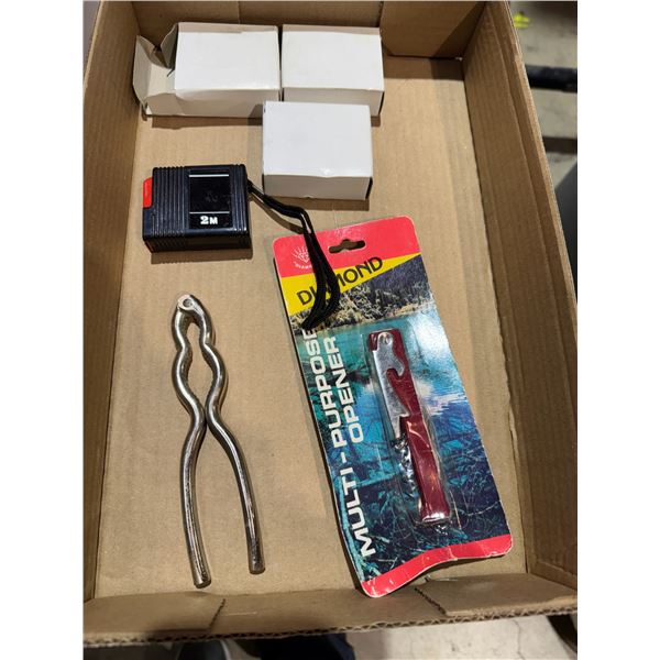 Measuring tapes Nutcracker and bottle opener