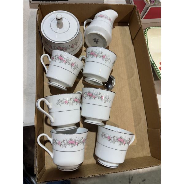 Mugs and cream and sugar dish