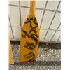 Image 3 : Gray owl, dragon boat paddles Canada