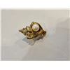 Image 1 : Pearl in shell (Gold?)