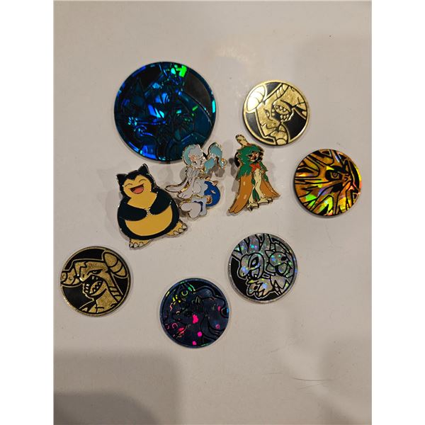 Pokemon tokens and pins